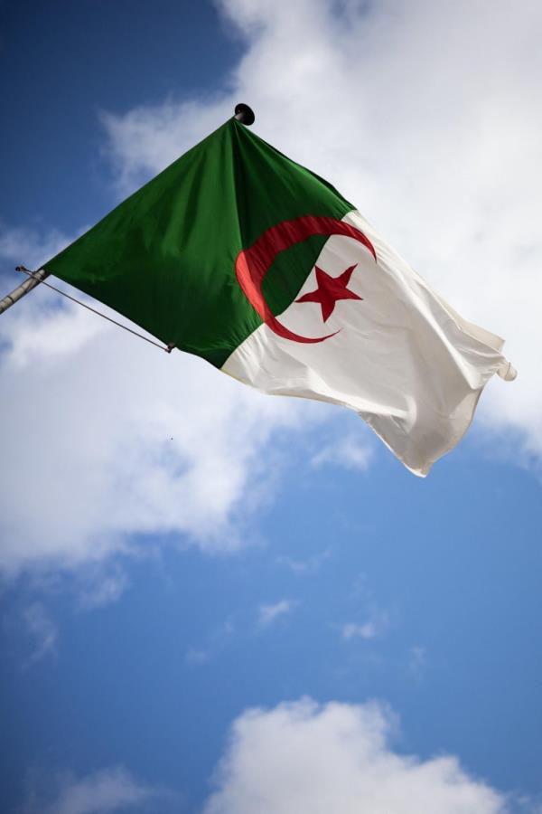the algerian flag on the building of the peoples democratic